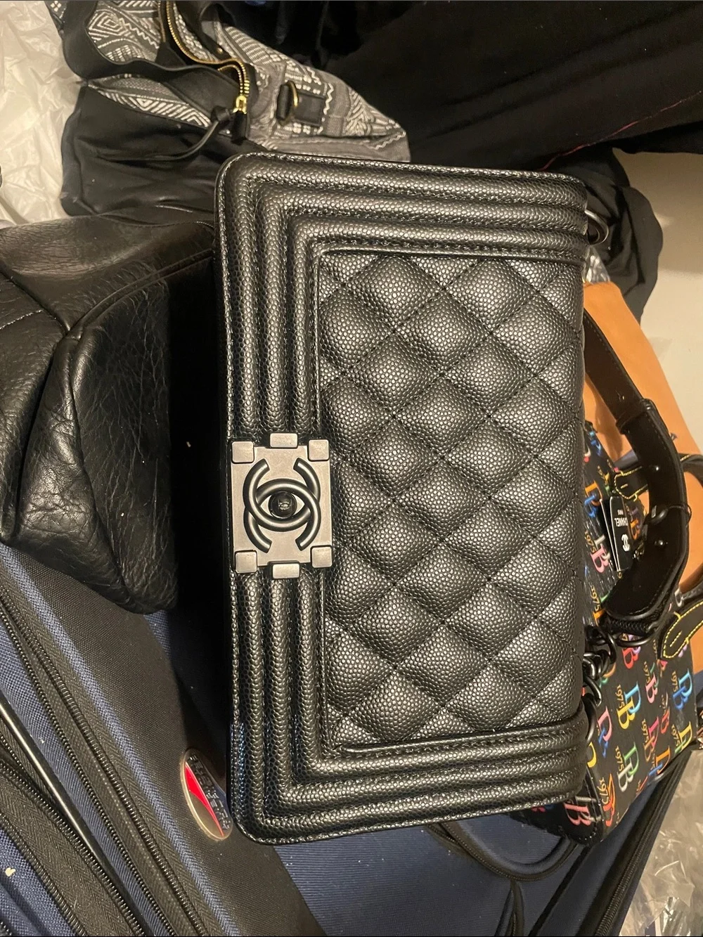 CHANEL Black Quilted Boy Wallet-on-Chain with Signature CC Lock